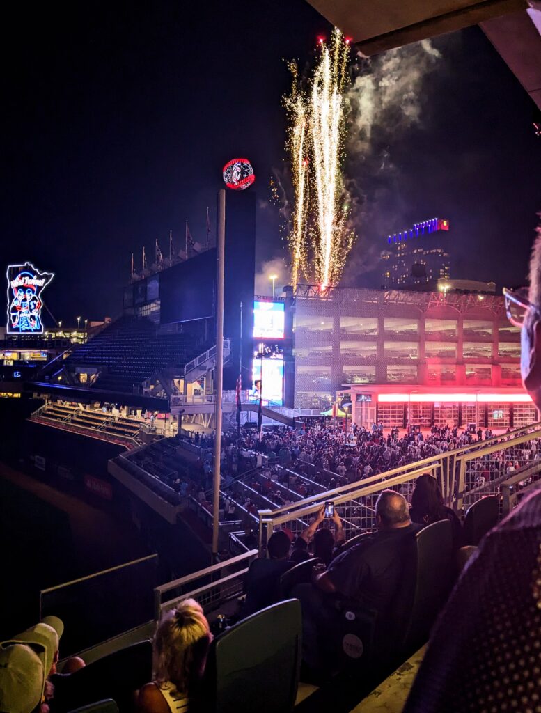 PXL_20230722_024756860.MP_ kiser construction crew watching firework show at target field