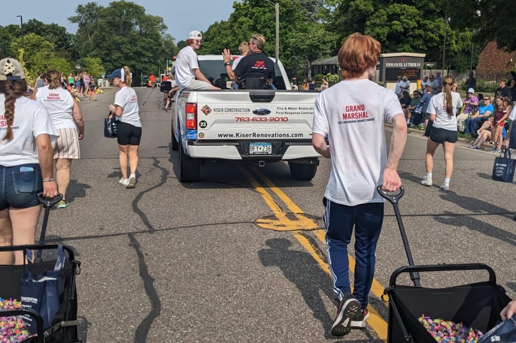 PXL_20230722_150928661.MP_-2 kiser construction grand marshal of 2023 sherburne county fair parade