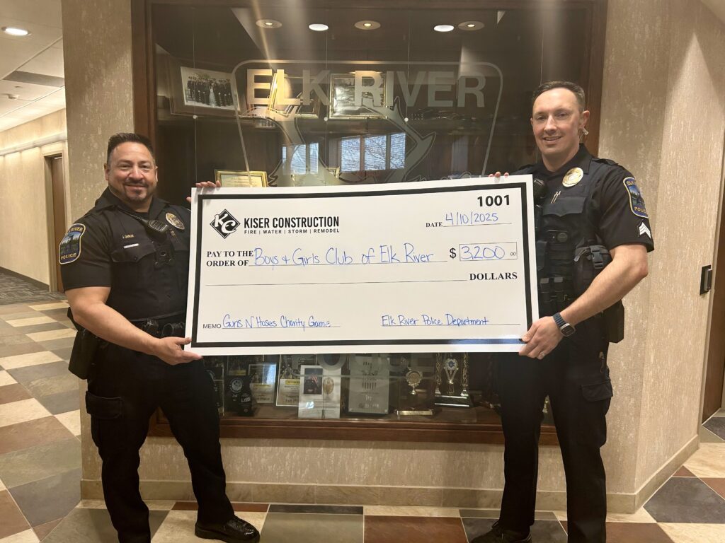 PD Check Presentation Elk River Police donation